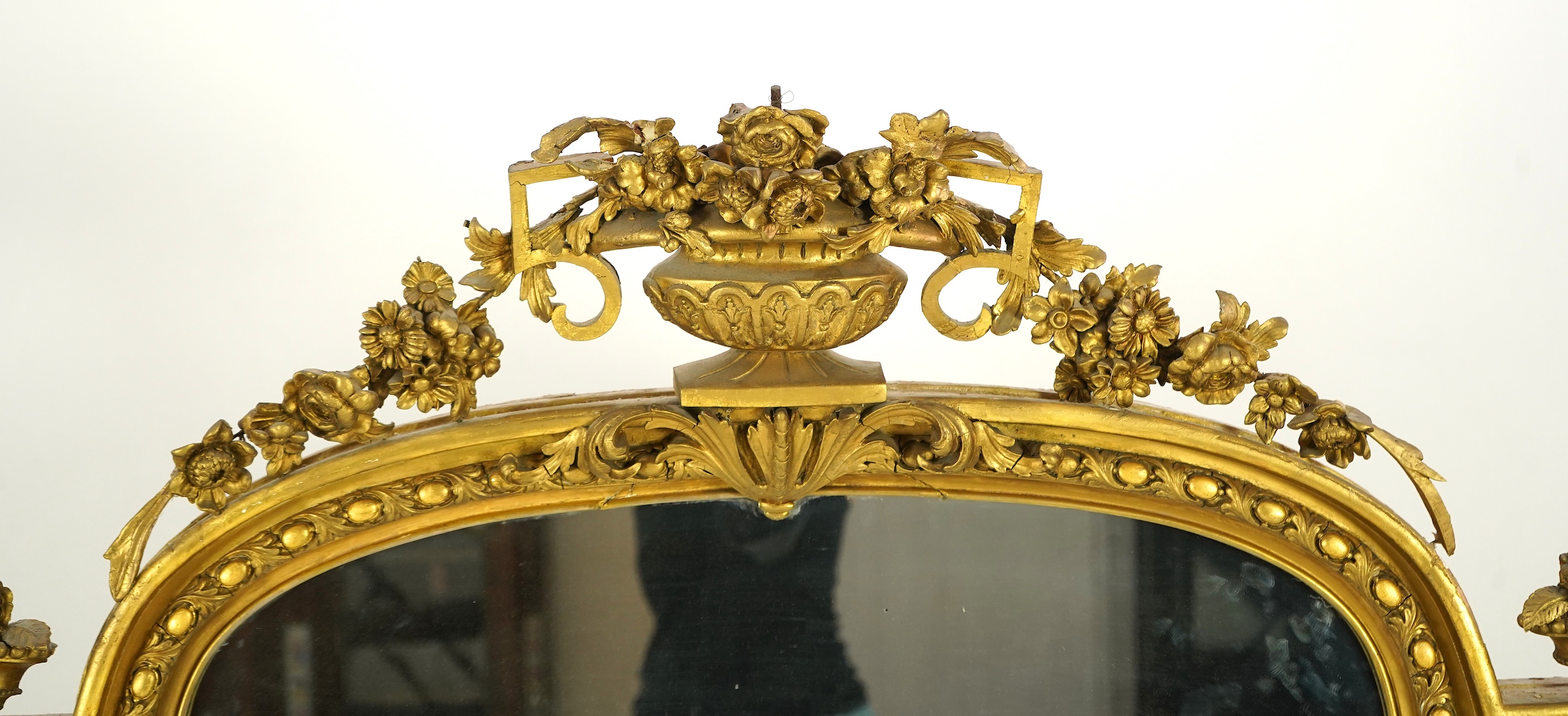 A Victorian giltwood and composition overmantel mirror